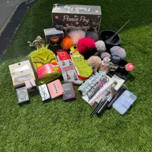 Pom-pom keyrings, false lashes, makeup brushes, socks, hair towel, earing backs, perfume, game set