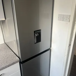Cooker fridge freezer and washing machine