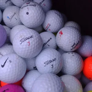 Various brands of golf balls – Titleist, Callaway, TaylorMade