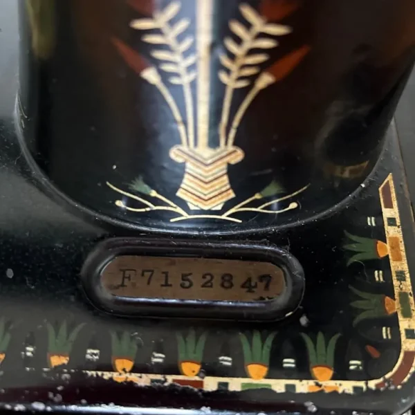 1916 Singer 66 with Lotus decal in cabinet