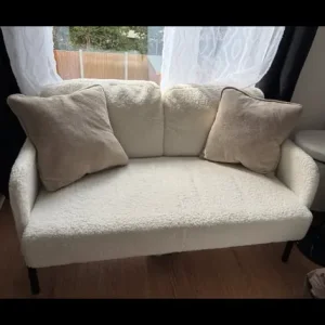 Small white fluffy 2 seater sofa