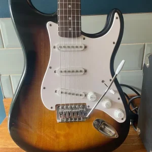 Fender Stratocaster with amp - Image 2