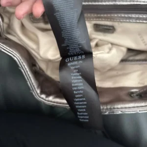 GUESS Miriam Silver Quilted Backpack. - Image 7