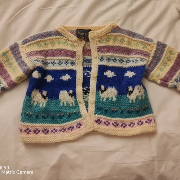 6-12 months. A Ronnie Avery Cardigan and hat'