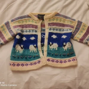 6-12 months. A Ronnie Avery Cardigan and hat'