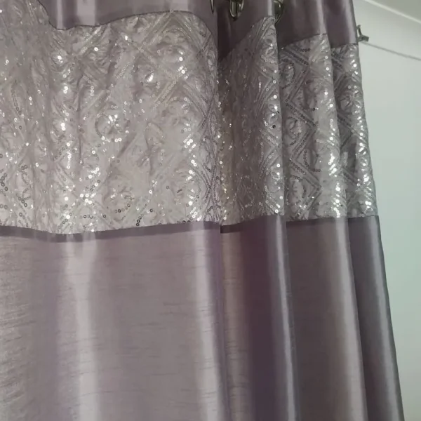 Curtains, cushions and lamp