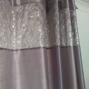 Curtains, cushions and lamp