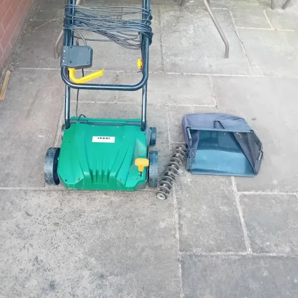 Lawn scarifier and rake
