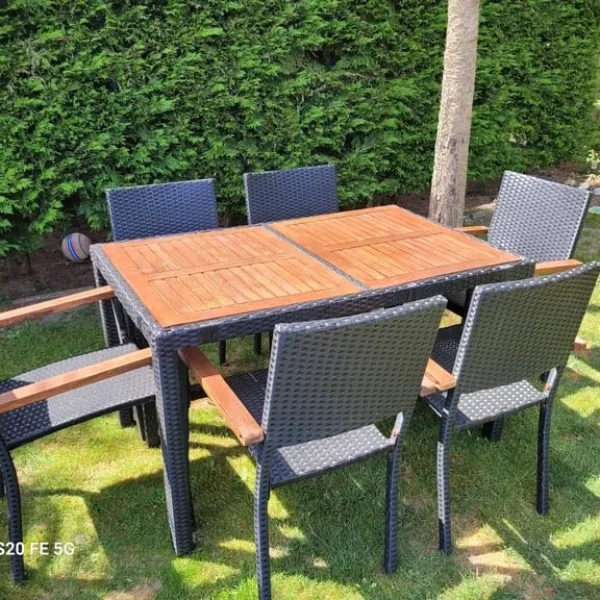 Black rattan framed garden table with 6 chairs, delivery available