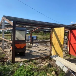 Approx 20m x 11m steel frame portal building single height doors inc