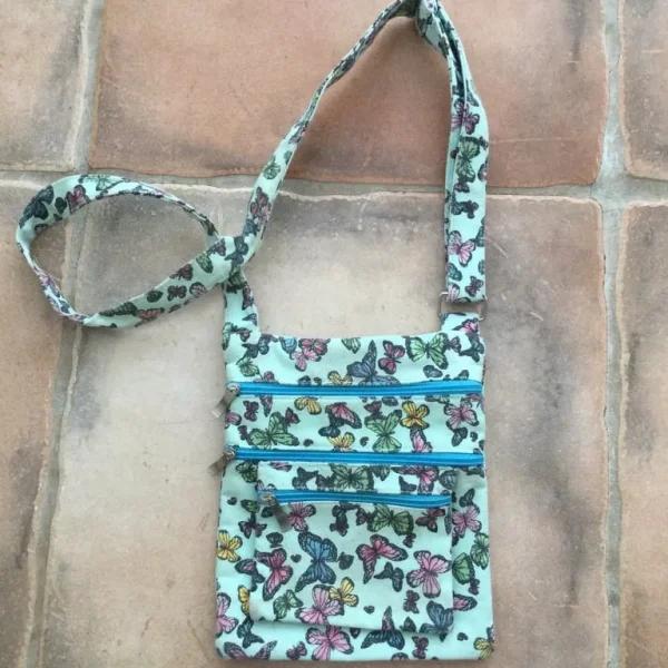 Handmade butterfly multi pocket bag with adjustable length strap.£6