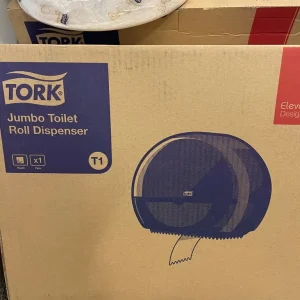 Toilet roll dispenser with toilet roll.+ soap dispenser.