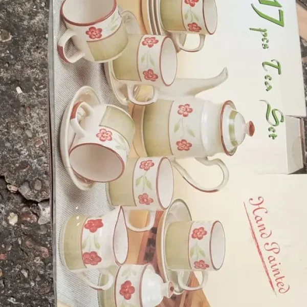 Boxed 17 piece hand painted tea set