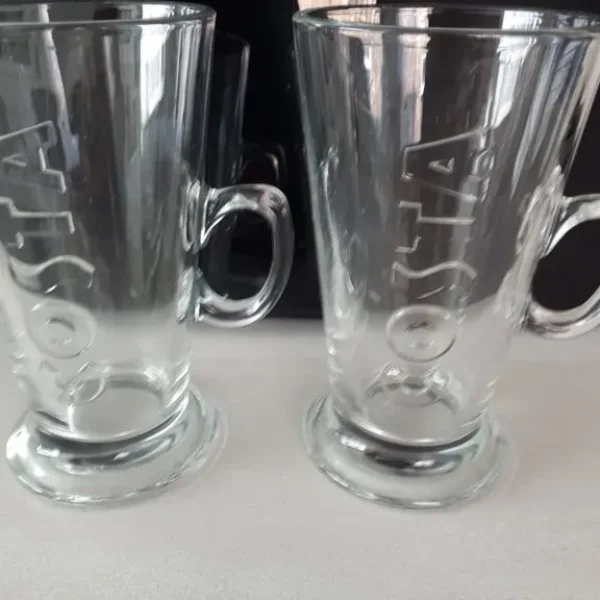 Two costa coffee cups new