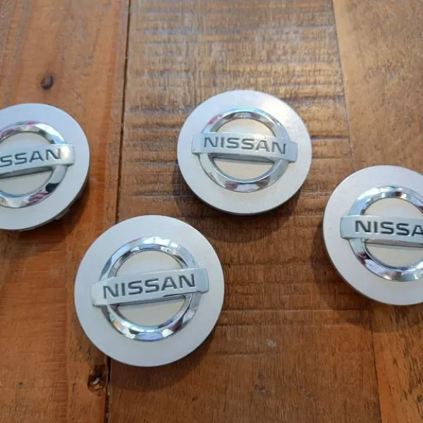 Nissan wheel centre caps - 58mm dia vgc