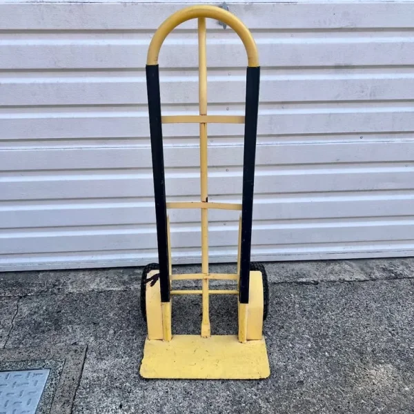 Yellow Hand Truck used and slightly paint out .