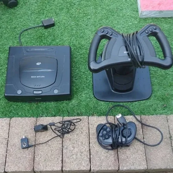 Sega Saturn console and games