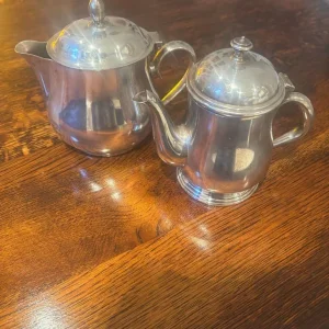 Silver plated teapot and creamer