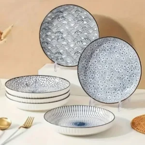 New & boxed - 4 ceramic plate set