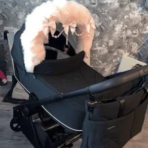 Black Venicci pram in original box