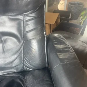 Black leather recliner and matching footstool - Image 2