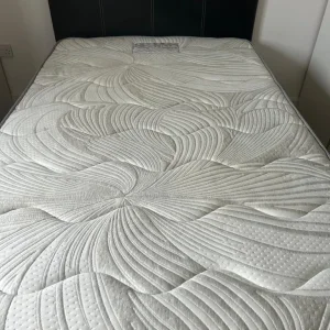 Small double bed with leather headboard - Image 2