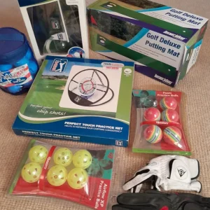 Golf accessories collection – putting mat, practice balls, gloves