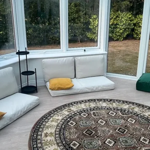 Various floor cushions, pouffes, footstools