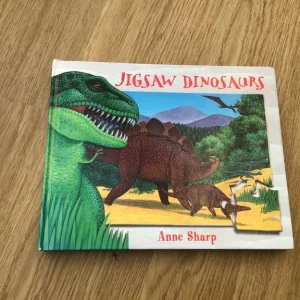 Jigsaw Dinosaur book UnFortunately 2 pieces Missing on 2 Pages Please see Photos
