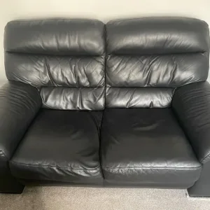 Black leather 2 seater sofa x2 with matching footstool - Image 3