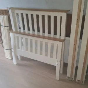 Single cream and oak bed