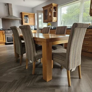 Solid oak dining table and 6 chairs