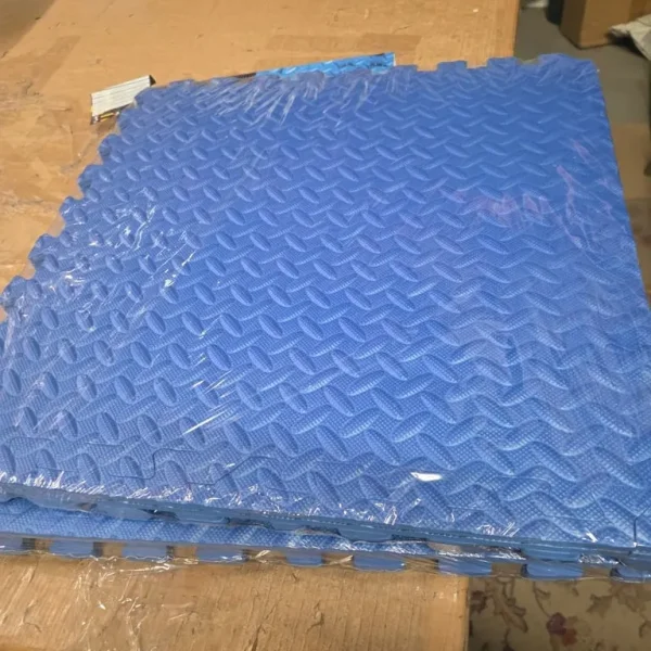 A new still boxed pack of 8 Foam Gym Mats