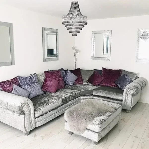 Corner sofa with footstool