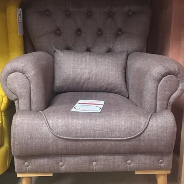 Buttoned brown armchair
