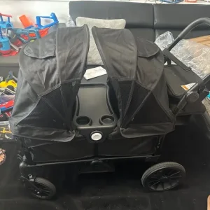 Black wagon stroller for 2 kids with adjustable handle and removable canopy - Image 3
