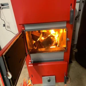 Solid fuel boiler, cut heating costs and burn logs, many in stock