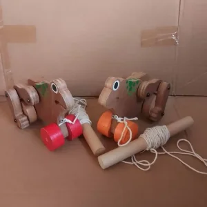 Wooden toy frogs