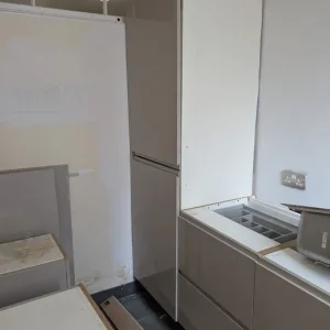 Kitchen units and fridge