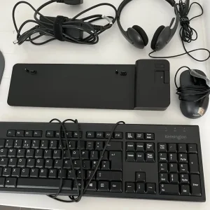 HP ultra slim laptop docking station, mouse, keyboard, cables and headphones