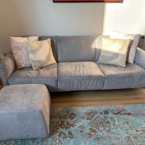 2 natuzzi sofas and 1 desk available