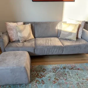 2 natuzzi sofas and 1 desk available