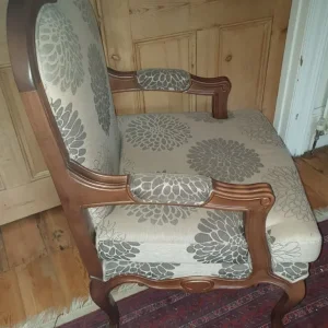 Luxury upholstered carved armchair