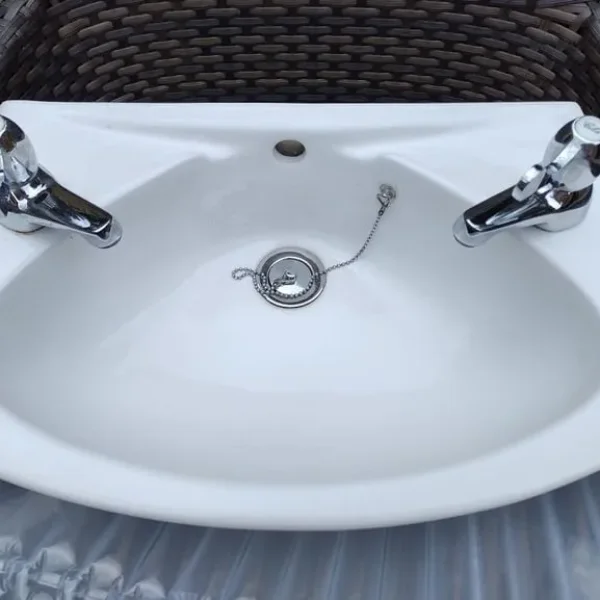 Armitage Shanks small washbasin and lever style taps