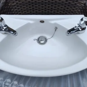 Armitage Shanks small washbasin and lever style taps