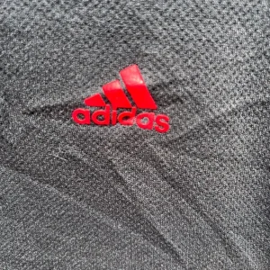 adidas Men's Long Sleeve Quarter Zip Golf Top, Size Large, Black - Image 4