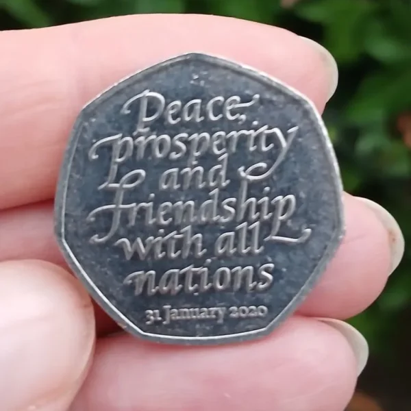 Peace, prosperity collectable 50 pence coin