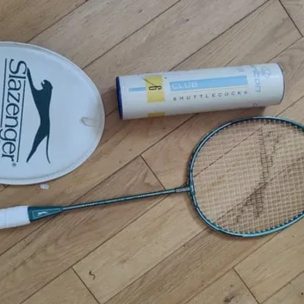 Nearly new slazenger badminton racket and a tube of shuttles