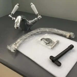 Basin chrome mixer taps with white porcelain handles - Image 4