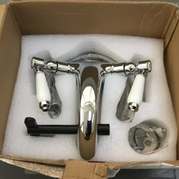 Basin chrome mixer taps with white porcelain handles